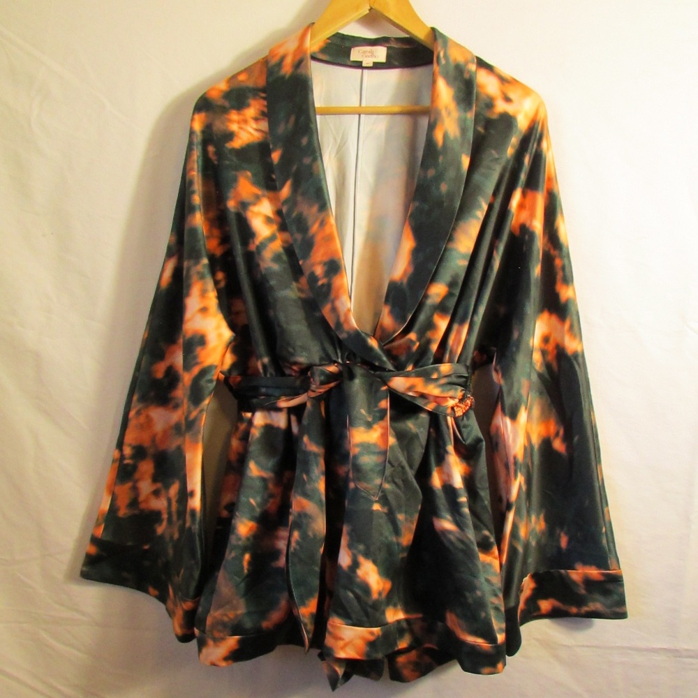 Camila Coelho Amelia Romper in an orange and teal tie-dye pattern